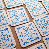 Art Nouveau cross pattern letterpress coaster, blue
