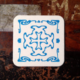 Art Nouveau cross pattern letterpress coaster, blue
