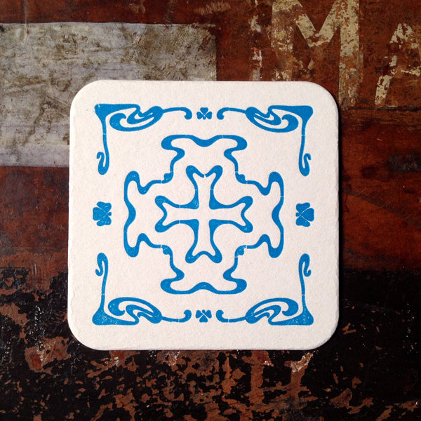 Art Nouveau cross pattern letterpress coaster, blue