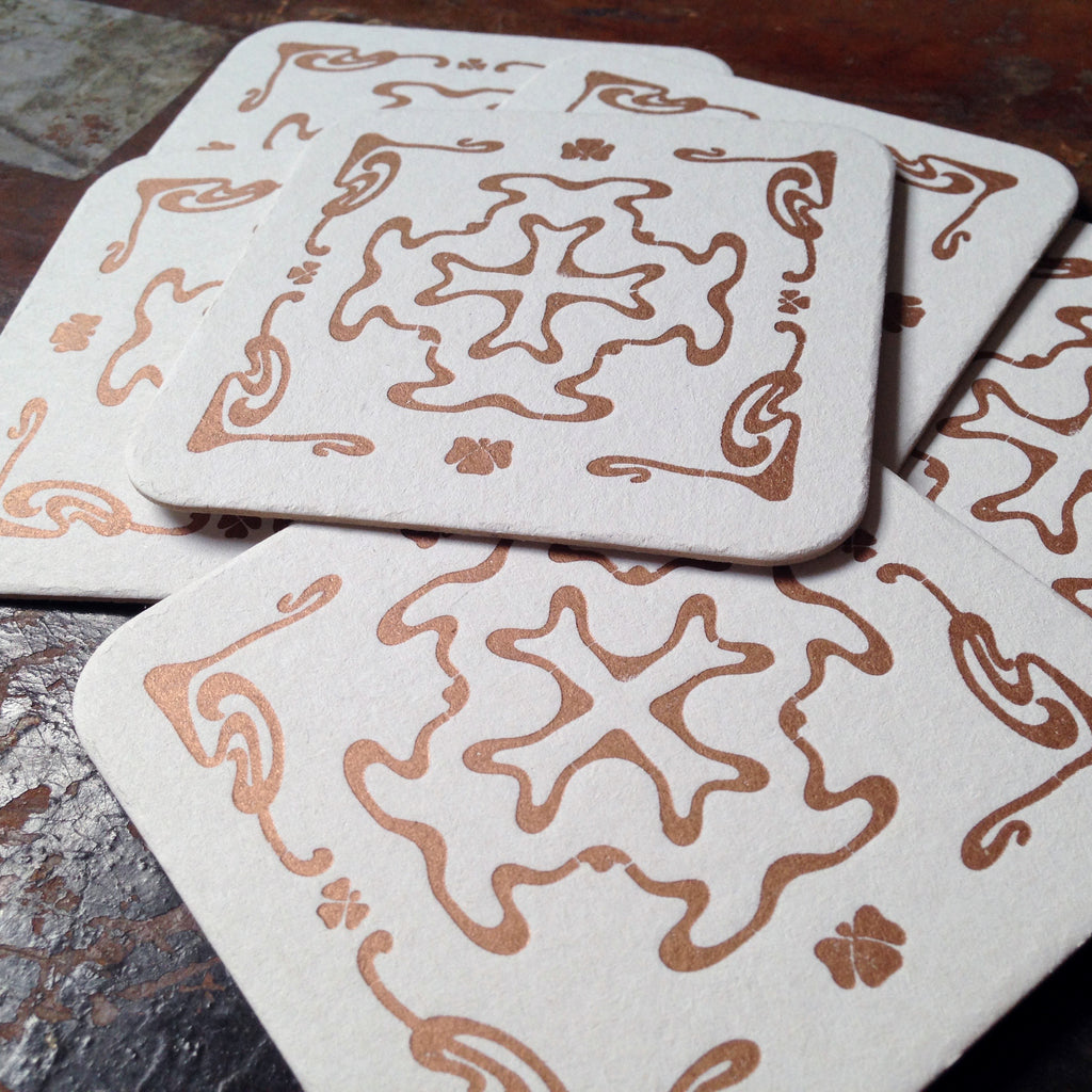 Art Nouveau cross pattern letterpress coaster, copper