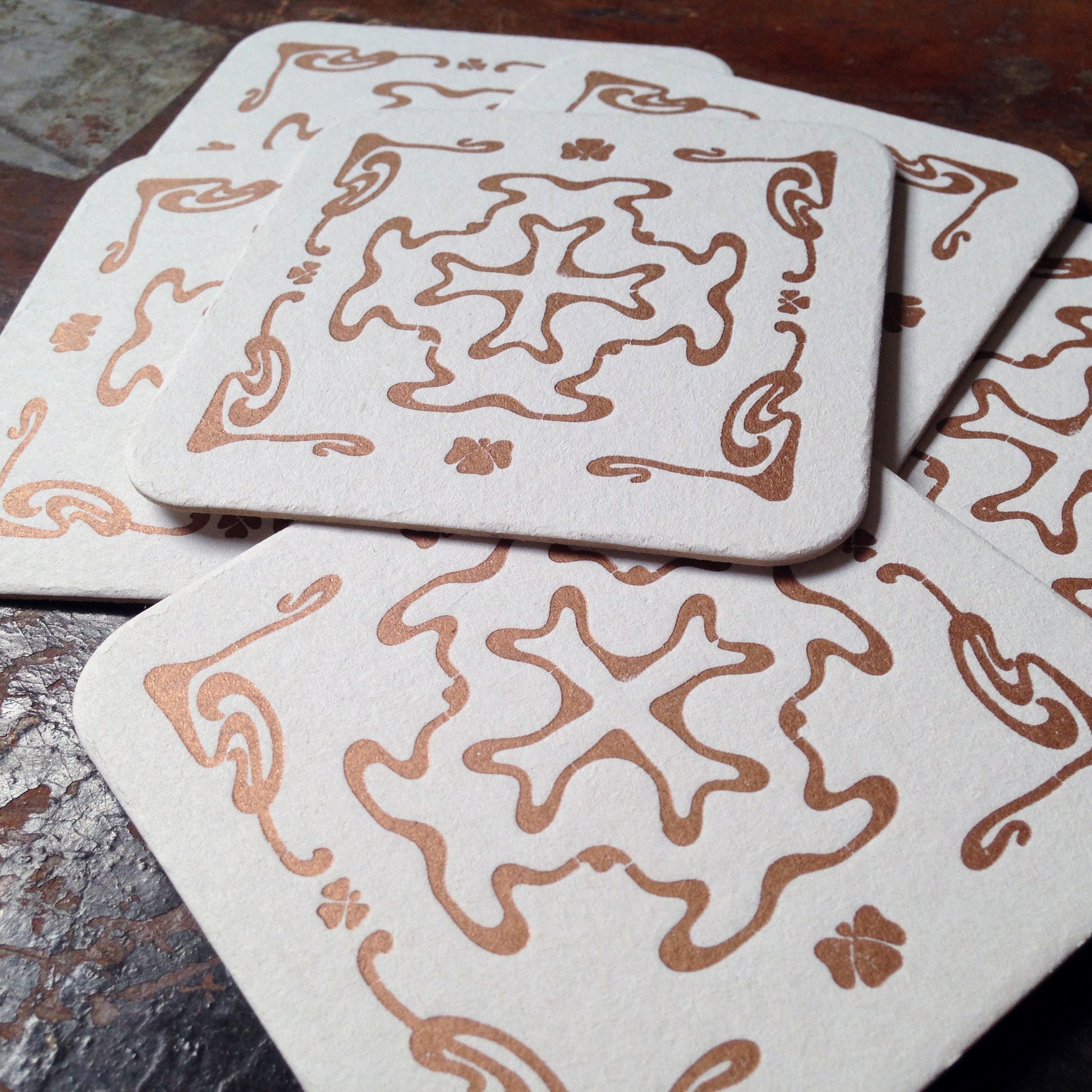 Art Nouveau cross pattern letterpress coaster, copper