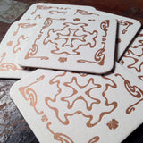 Art Nouveau cross pattern letterpress coaster, copper