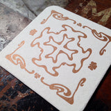 Art Nouveau cross pattern letterpress coaster, copper