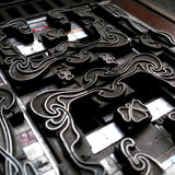 Art Nouveau letterpress coaster design locked up ready to print
