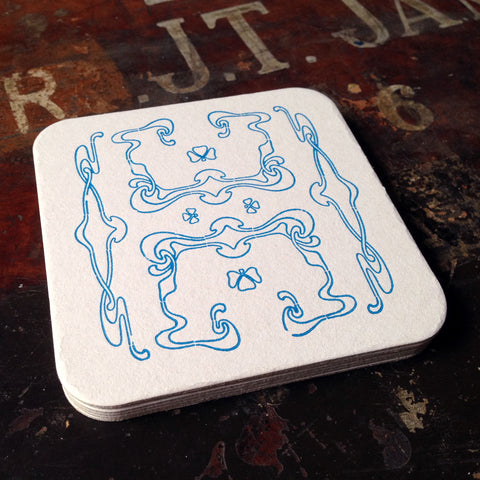 Art Nouveau panel pattern letterpress coaster, blue