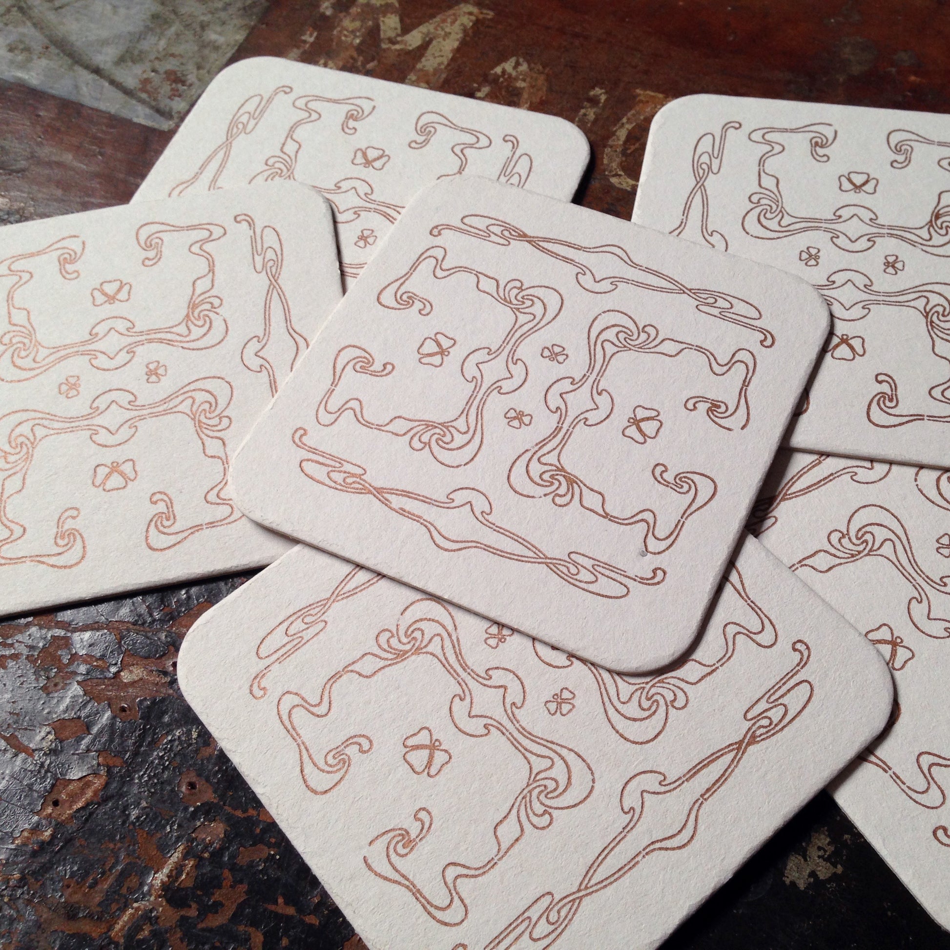 Art Nouveau panel pattern letterpress coaster, copper