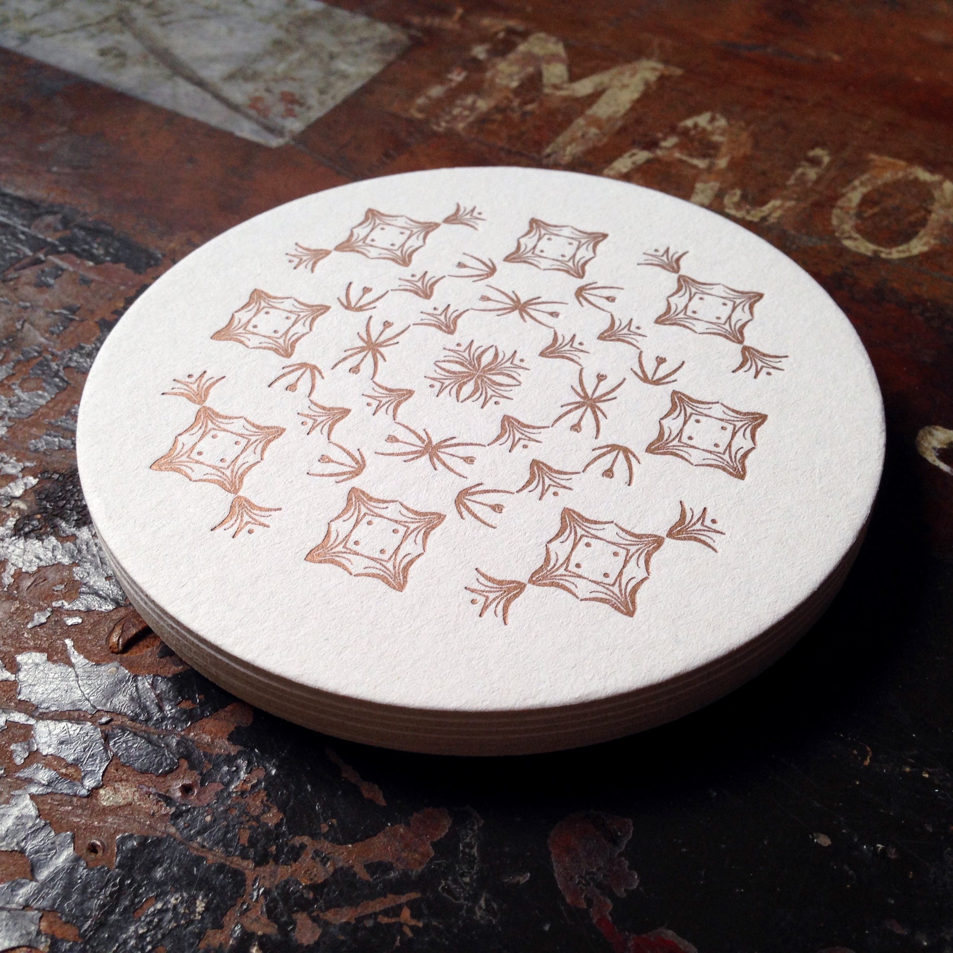Glint ornament letterpress coaster, copper