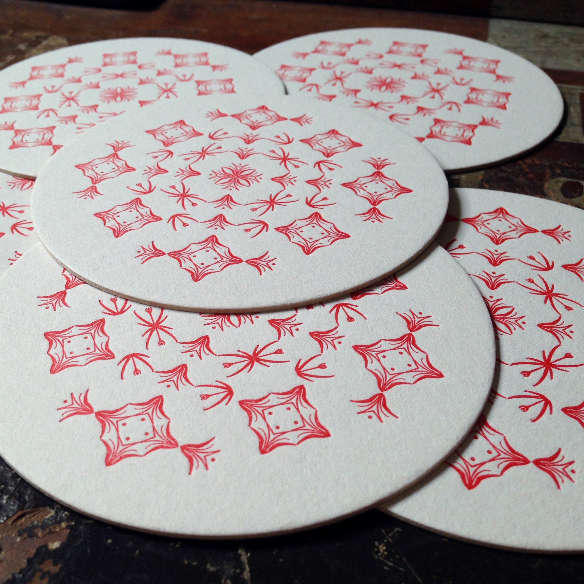 Glint ornament letterpress coaster, red