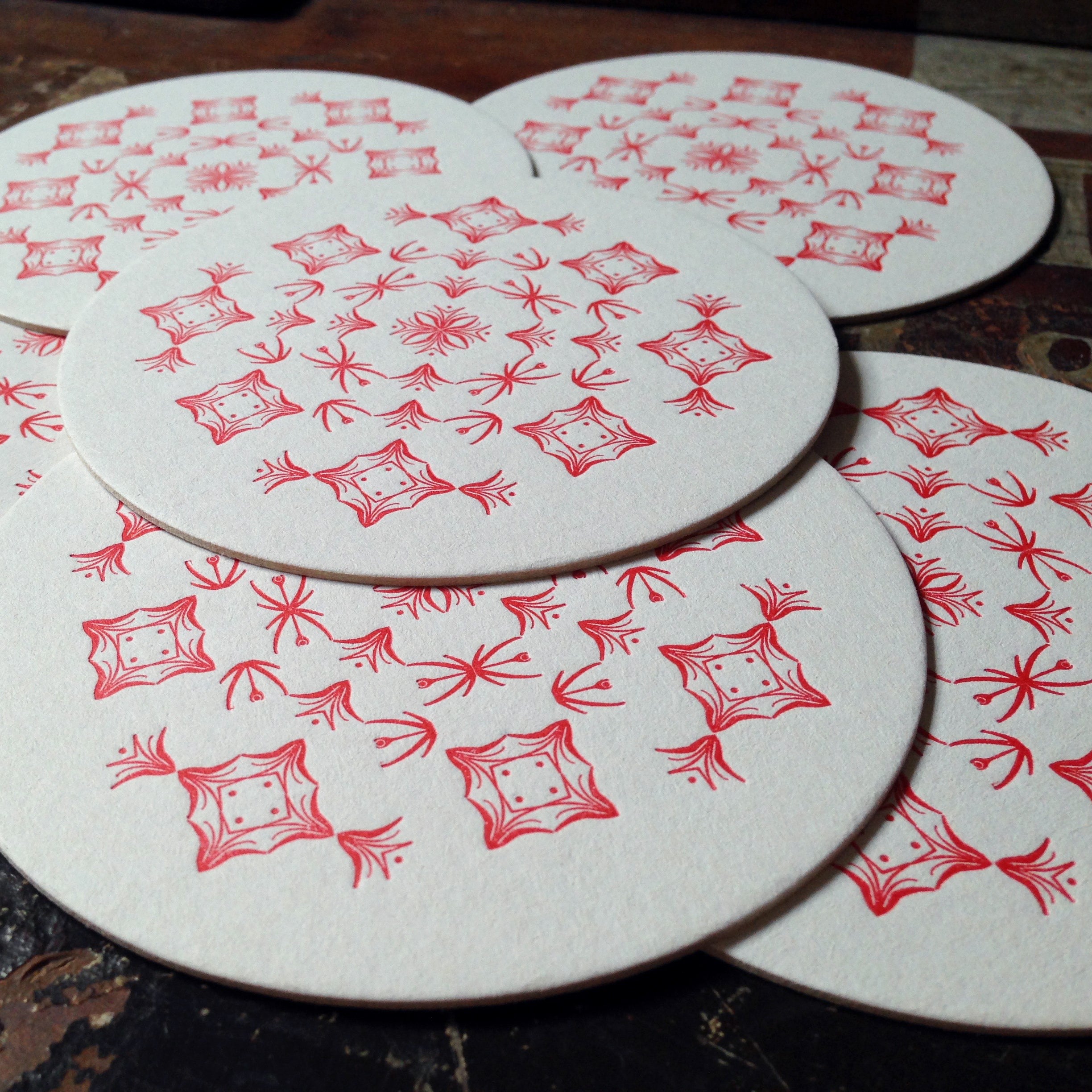 Glint ornament letterpress coaster, red