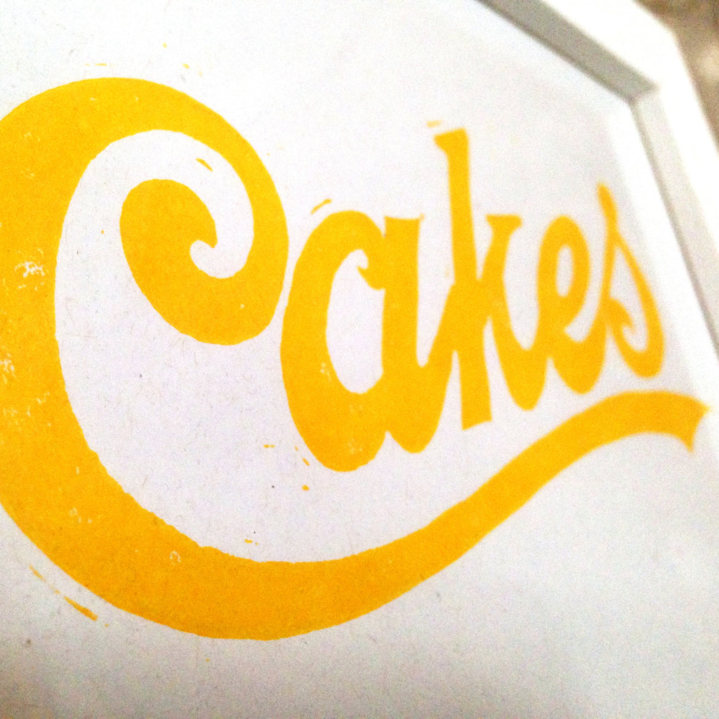 Cakes linocut print, framed