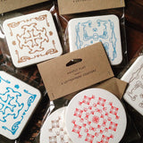 Packs of six Mostly Flat letterpress printed ornament coasters
